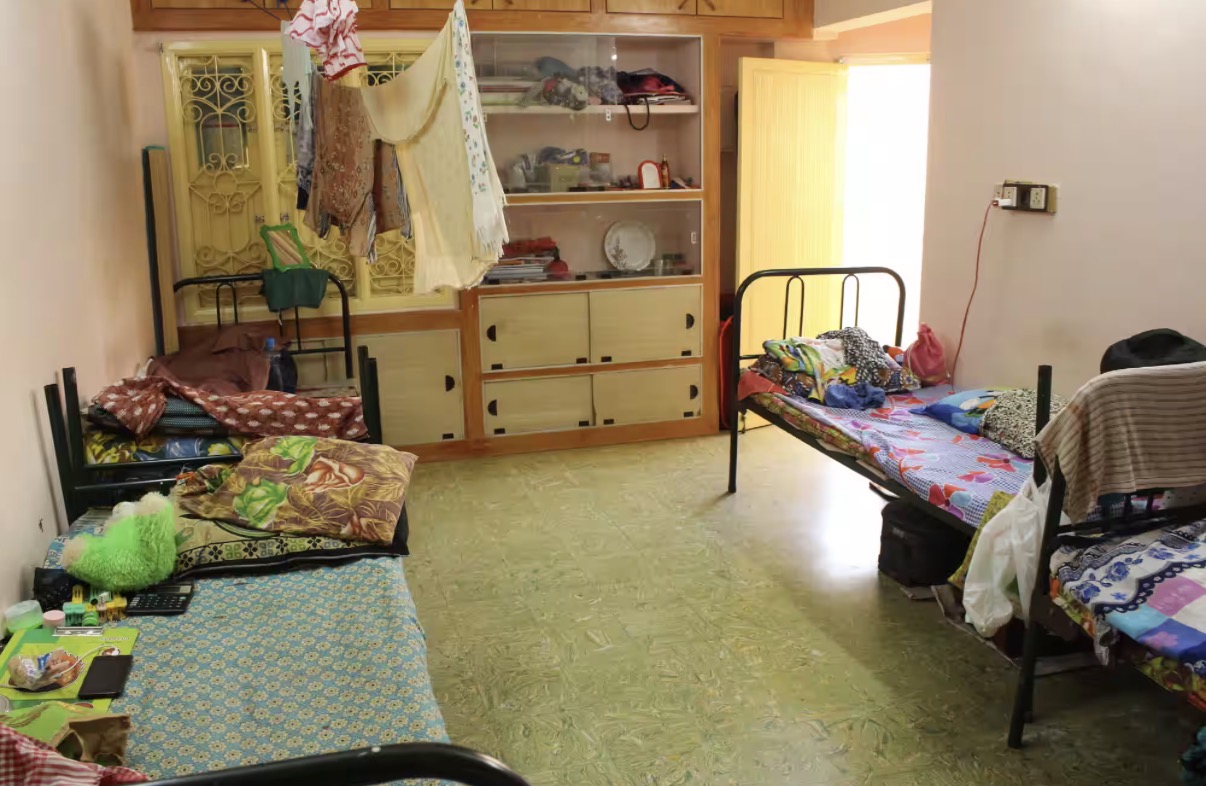 Spacious sharing room with wardrobes and storage